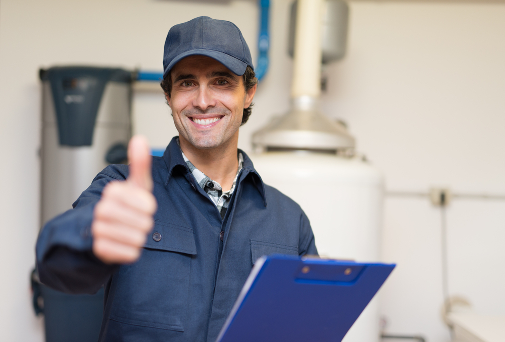 Smiling,Technician,Servicing,A,Hot-water,Heater