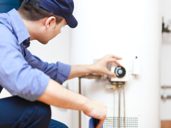 Plumber,Repairing,An,Hot-water,Heater